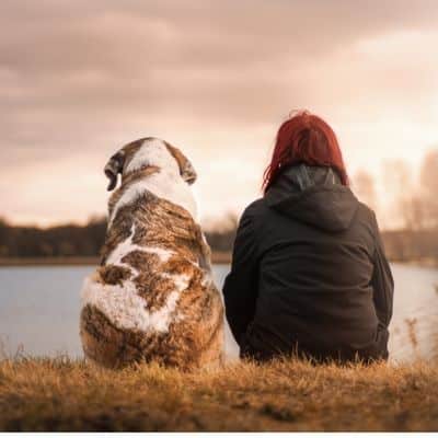woman with dog at pond sarasota pet euthanasia